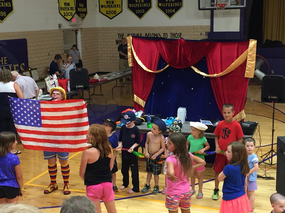 Silly Sally on stage performing patriotic tribute for 4th of July